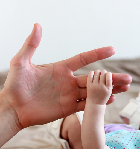 Adult _ baby hands